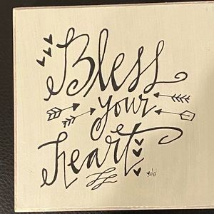 Bless Your Heart decorative wooden object. Cream painted background &black print